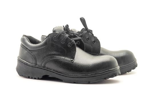 Protective workwear black safety shoes on white background.