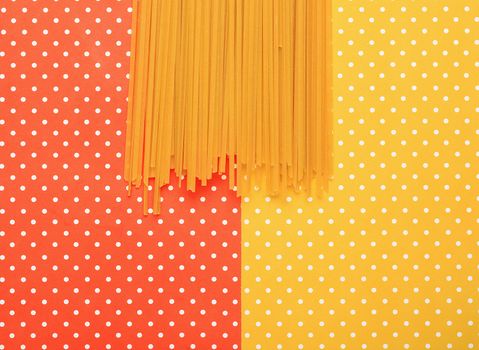 Spaghetti with colorful topped background
