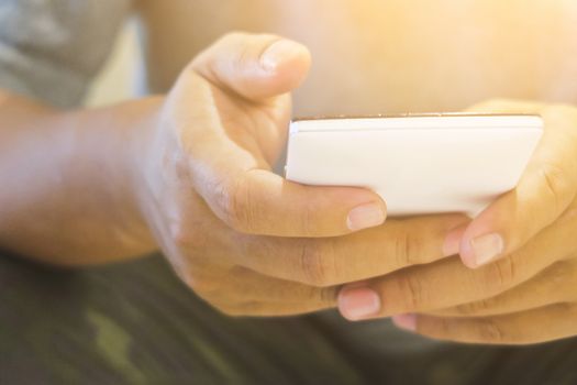 close up of hand typing on phone