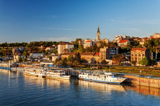 Belgrade from river Sava with tourist riverboats on a sunny day