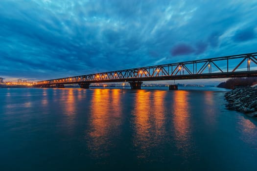 Bridge across river at night with artificial lightning, Belgrade Serbia