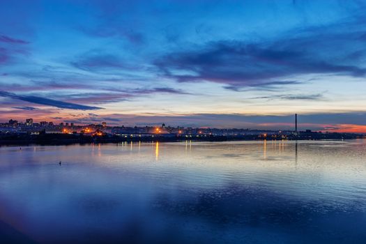 Panorama of Belgrade at night with river Danube