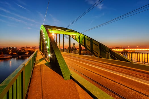 Bridge across river at night with artificial lightning, Belgrade Serbia