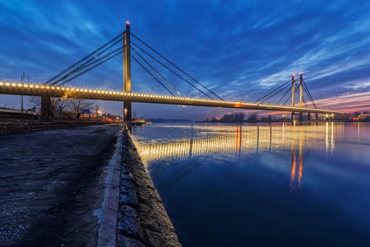 Bridge across river at night with artificial lightning, Belgrade Serbia