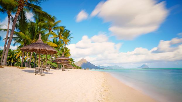 Relaxing on remote Paradise beach,typical tropical beach at Mauritius island.