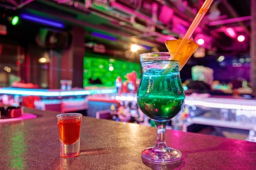 cocktail at bar in a night club with vivid colors