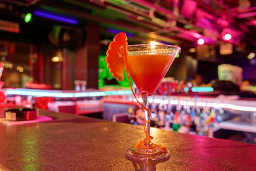 cocktail at bar in a night club with vivid colors