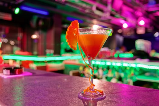 cocktail at bar in a night club with vivid colors