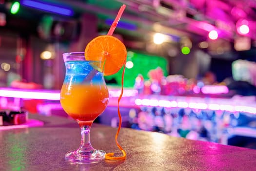 cocktail at bar in a night club with vivid colors