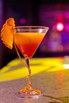 cocktail at bar in a night club with vivid colors