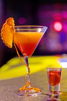 cocktail at bar in a night club with vivid colors