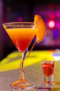 cocktail at bar in a night club with vivid colors