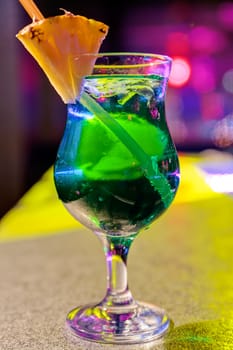 cocktail at bar in a night club with vivid colors