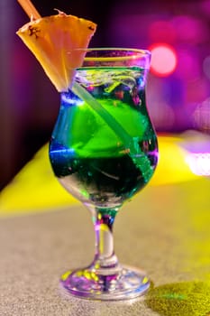 cocktail at bar in a night club with vivid colors