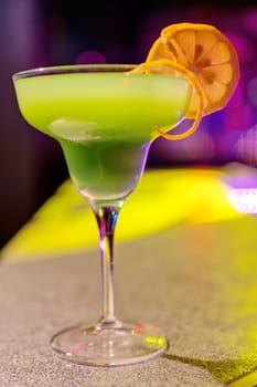 cocktail at bar in a night club with vivid colors