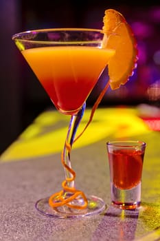 cocktail at bar in a night club with vivid colors