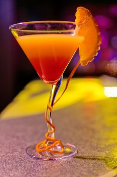 cocktail at bar in a night club with vivid colors