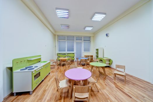 A preschool with little furniture for small children between the ages of three and five