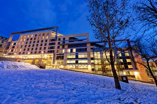 Modern building exterior with glass and metallic facade