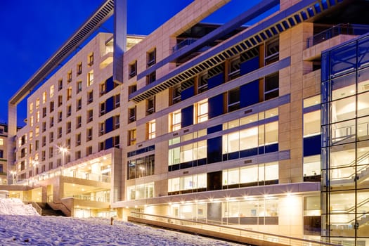 Modern building exterior with glass and metallic facade