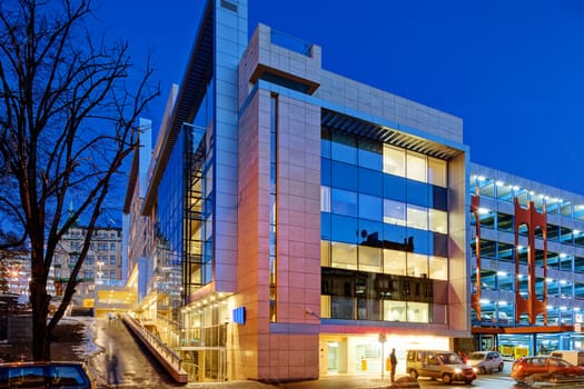 Modern building exterior with glass and metallic facade