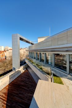 Terrace with metal and glass construction in modern building