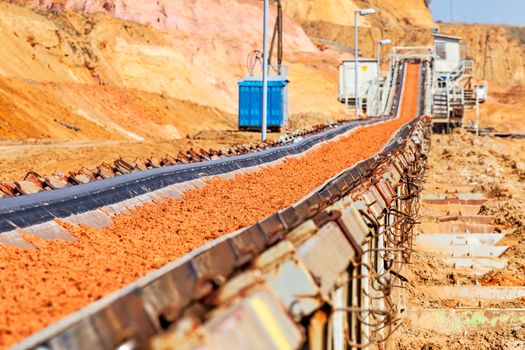 open coal mining pit with heavy machinery