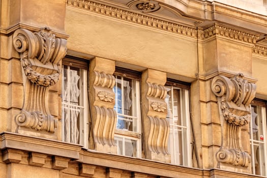 stone facade on classical building with ornaments and sculptures