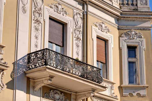 stone facade on classical building with ornaments and sculptures