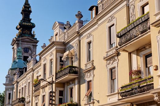 Stone facade on classical building with ornaments and sculptures