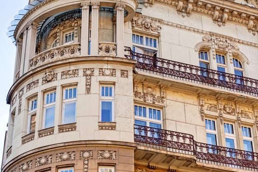 stone facade on classical building with ornaments and sculptures