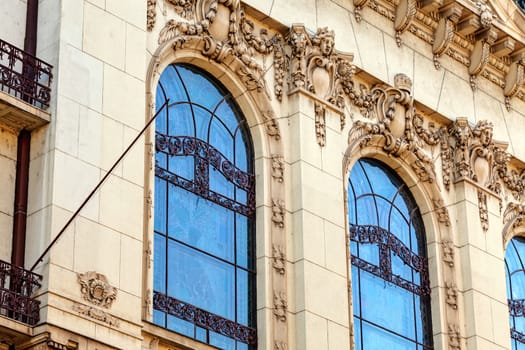 stone facade on classical building with ornaments and sculptures