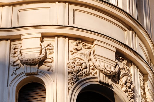 stone facade on classical building with ornaments and sculptures