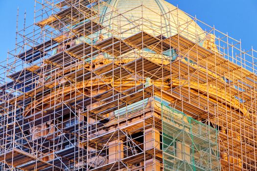 building construction with scaffolding