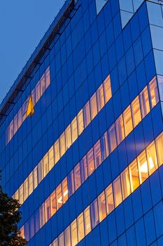 Detail of modern building  glass facade with reflections