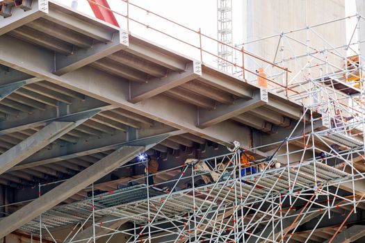 steel bridge construction with scaffolding