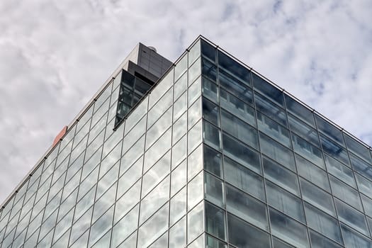 Detail of modern building  glass facade with reflections