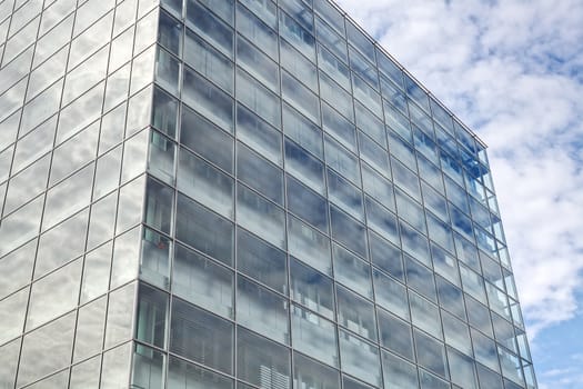 Detail of modern building  glass facade with reflections