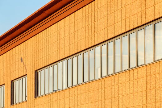 Exterior of industrial building on a sunny day