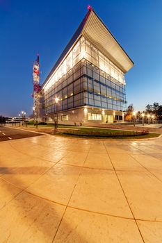 Modern building exterior with glass and metallic facade