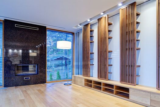 Interior of modern apartment with empty living room