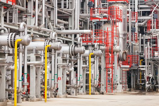 detail of oil pipeline with valves in large oil refinery