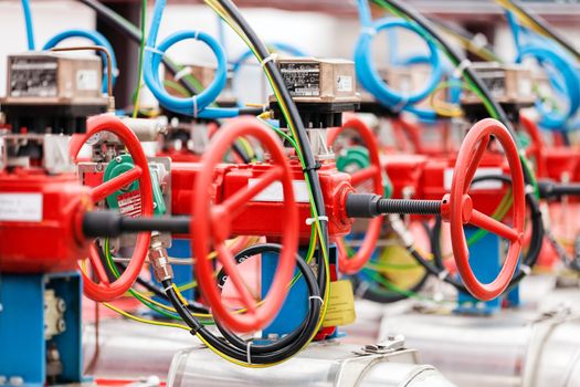 detail of oil pipeline with valves in large oil refinery