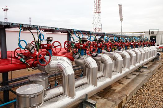 detail of oil pipeline with valves in large oil refinery