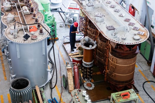 details of broken high voltage power transformer at repair shop