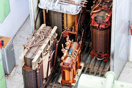 details of broken high voltage power transformer at repair shop