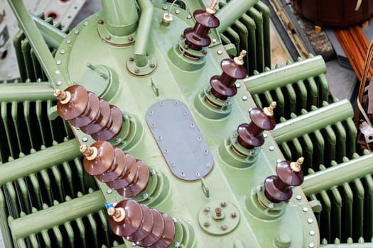 details of broken high voltage power transformer at repair shop