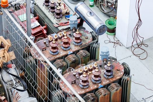 details of broken high voltage power transformer at repair shop