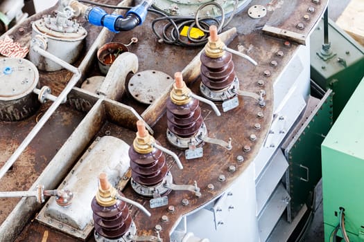 details of broken high voltage power transformer at repair shop