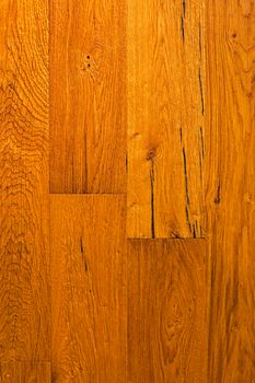 texture of wooden worm colored parquet floor